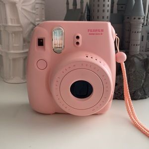 Pink Mini polaroid camera